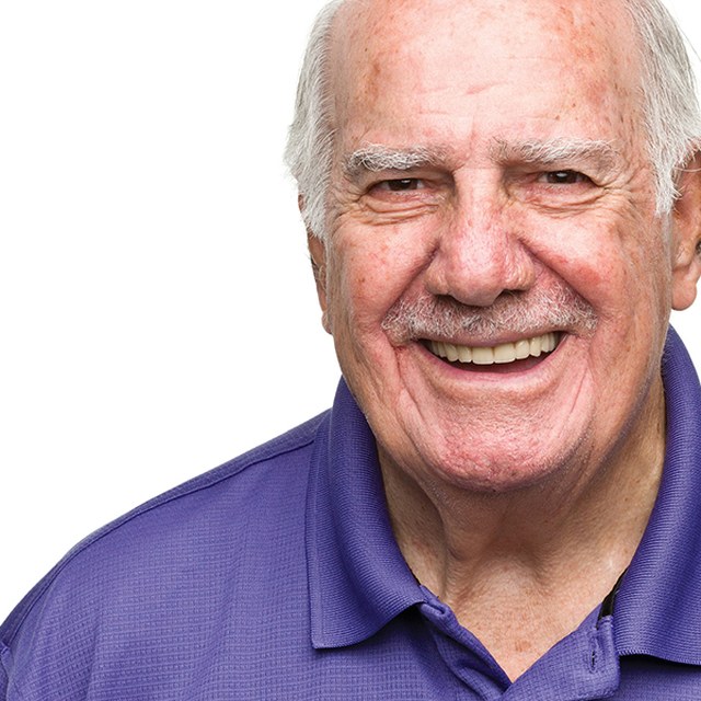 Smiling older man in a polo shirt