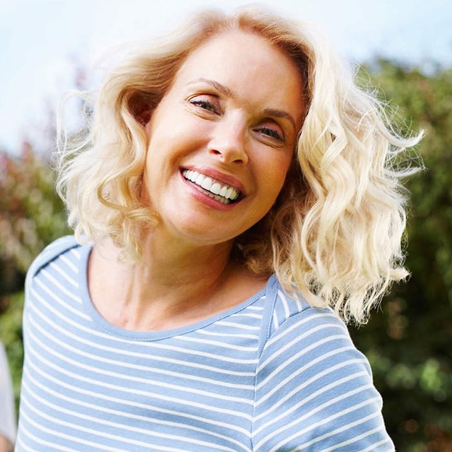 Smiling woman outdoors